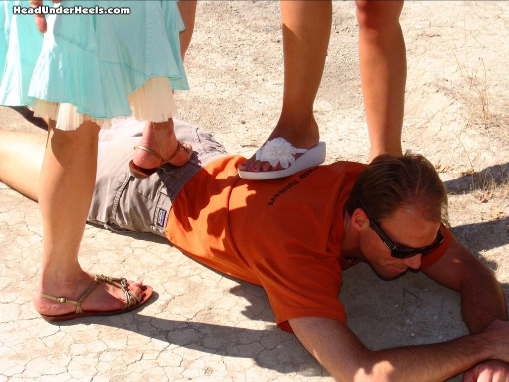 Face trampling slave with barefeet
